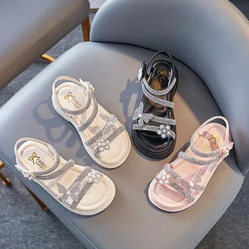 בנות קיץ סנדלים חלולים החוצה בוהן פתוח אופנה קשת יהלומים מלאכותיים נסיכה סנדלים מתוקים נעלי ילדים נעלי החוף בחוץ